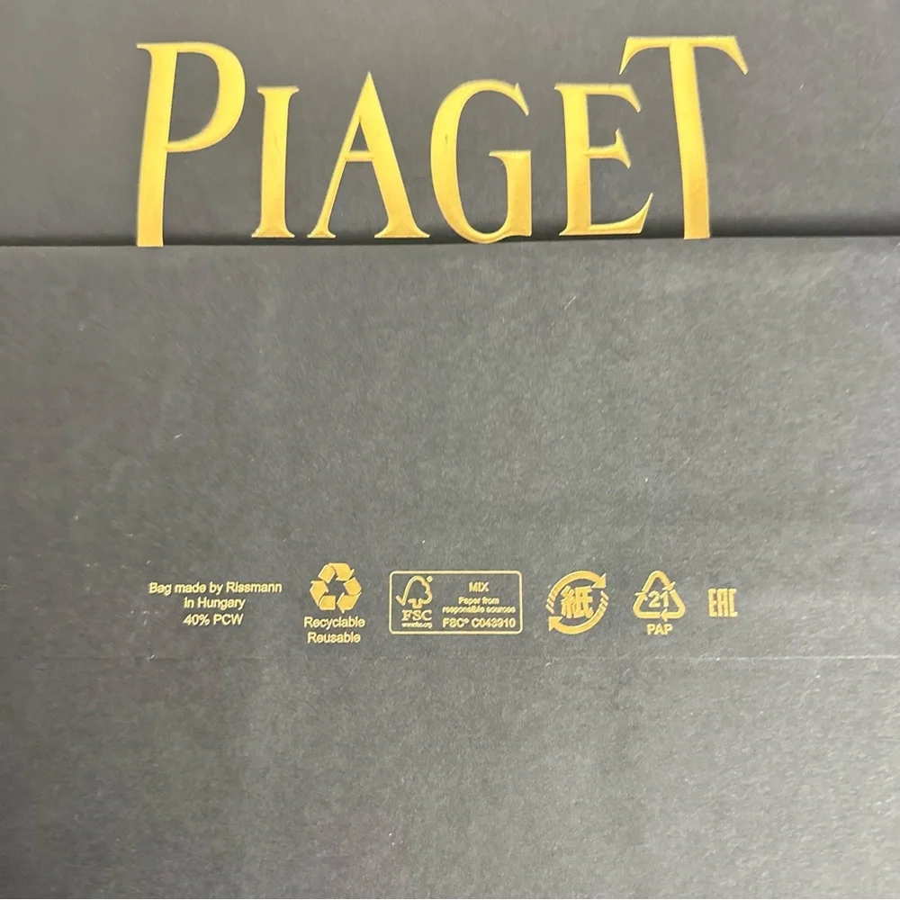 Piaget Luxurious Black and Gold Bag
